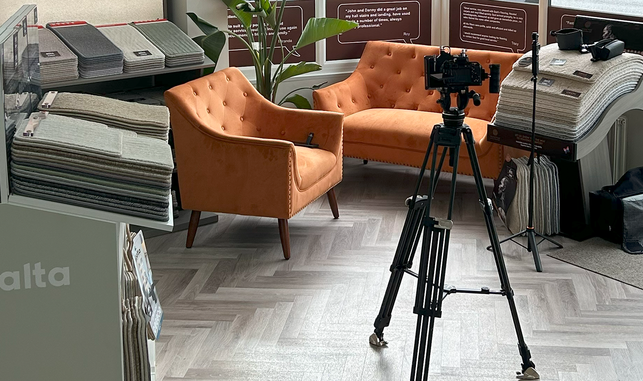 Camera set up inside a flooring showroom for an EGEN content shoot